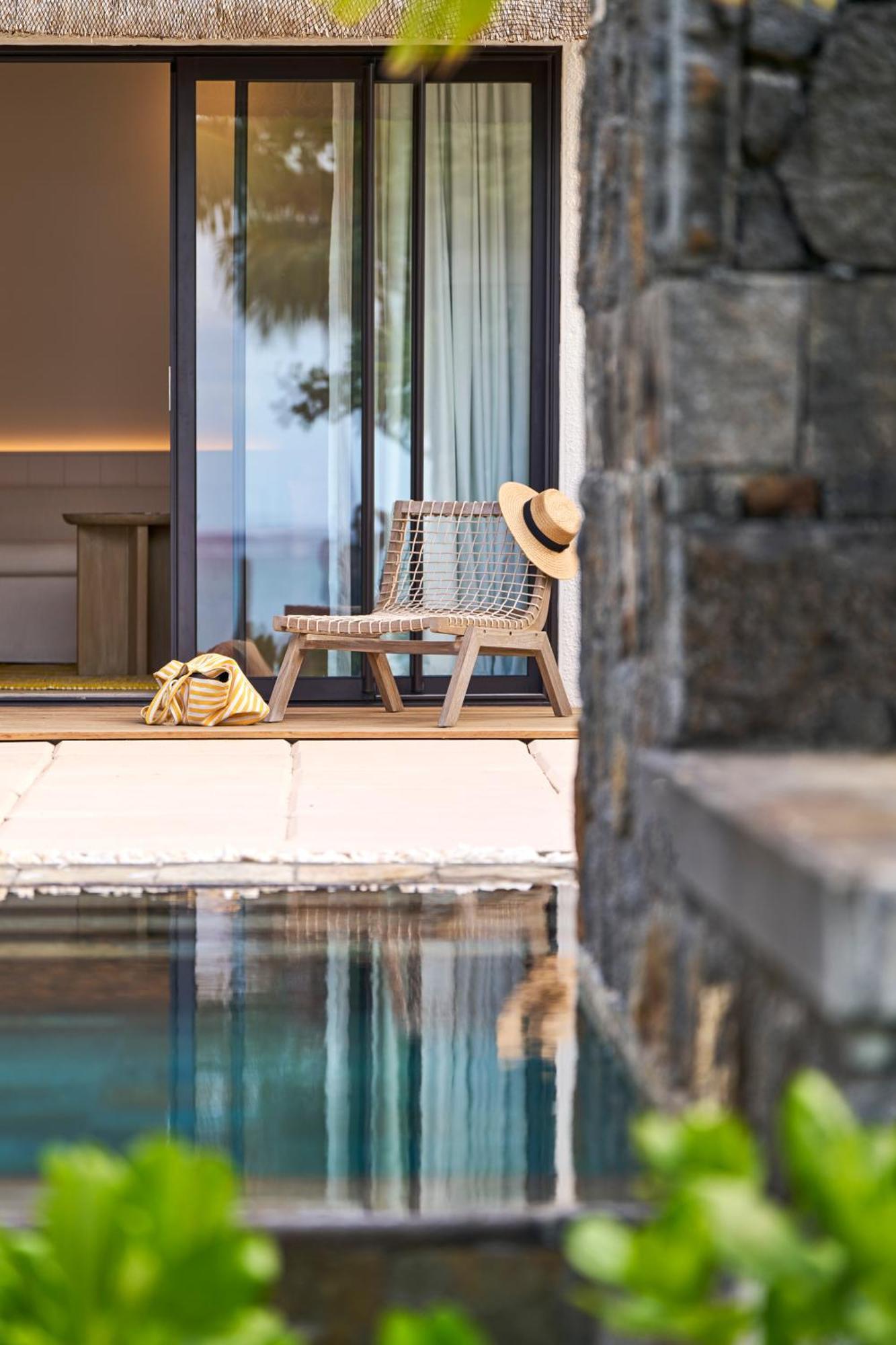 LUX* Belle Mare Resort&Villas Esterno foto The hotel's pool