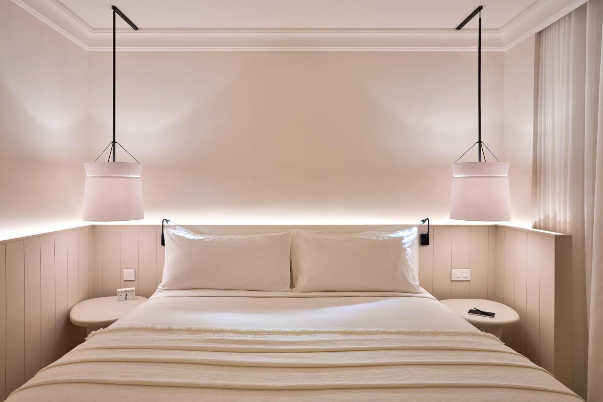 LUX* Belle Mare Resort&Villas Esterno foto A bedroom at The Standard East Village
