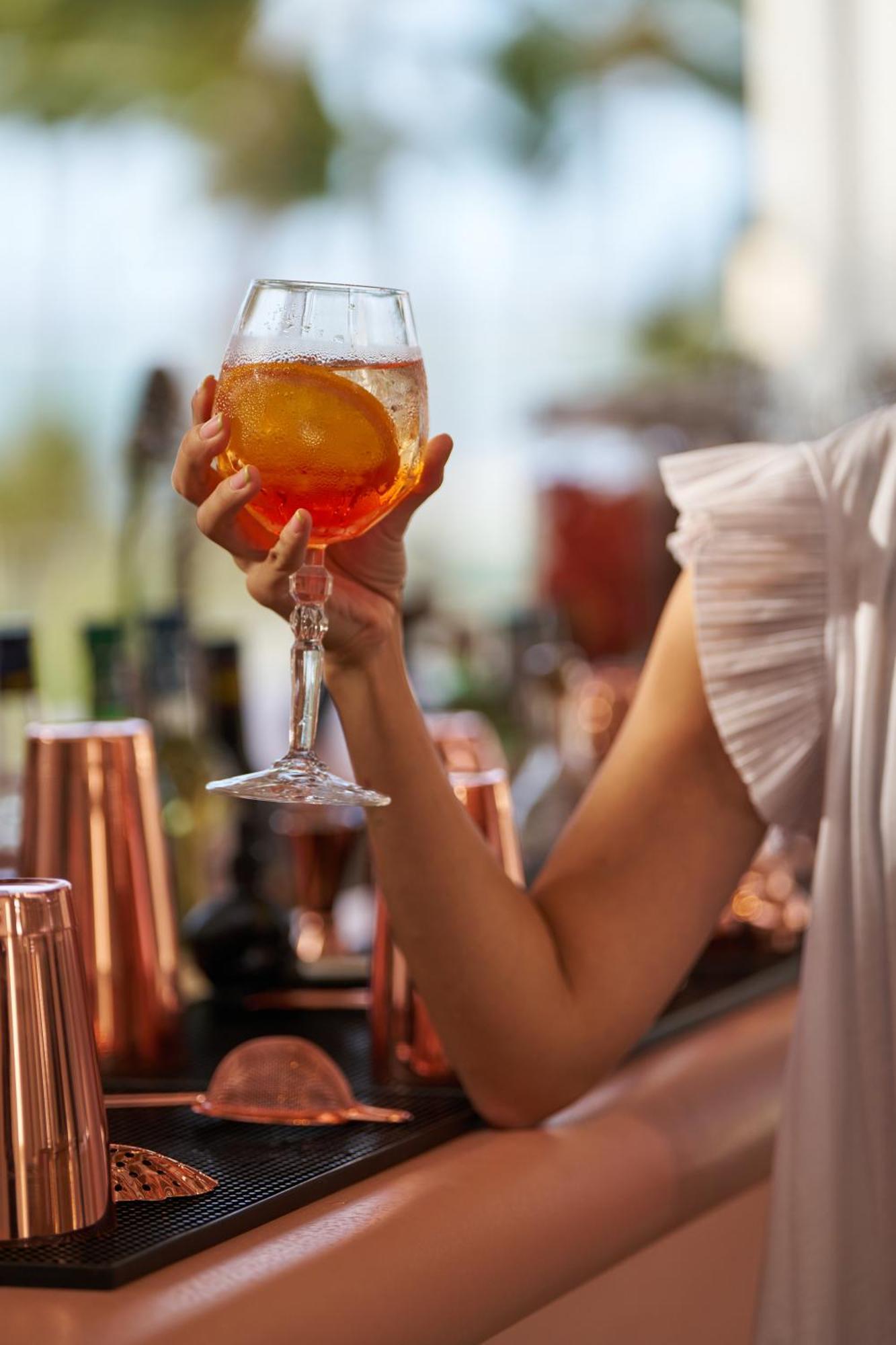 LUX* Belle Mare Resort&Villas Esterno foto A glass of Aperol Spritz