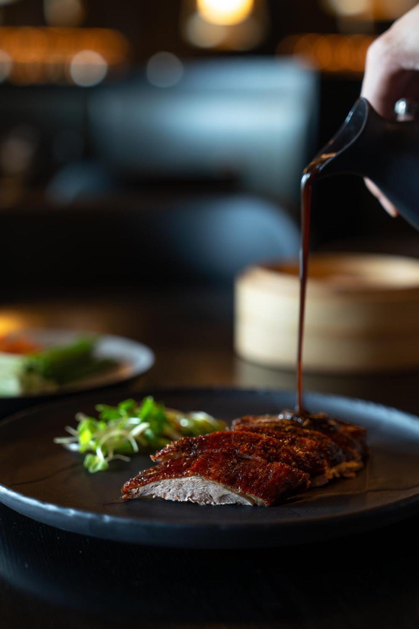 LUX* Belle Mare Resort&Villas Esterno foto Soy sauce being drizzled onto a dish