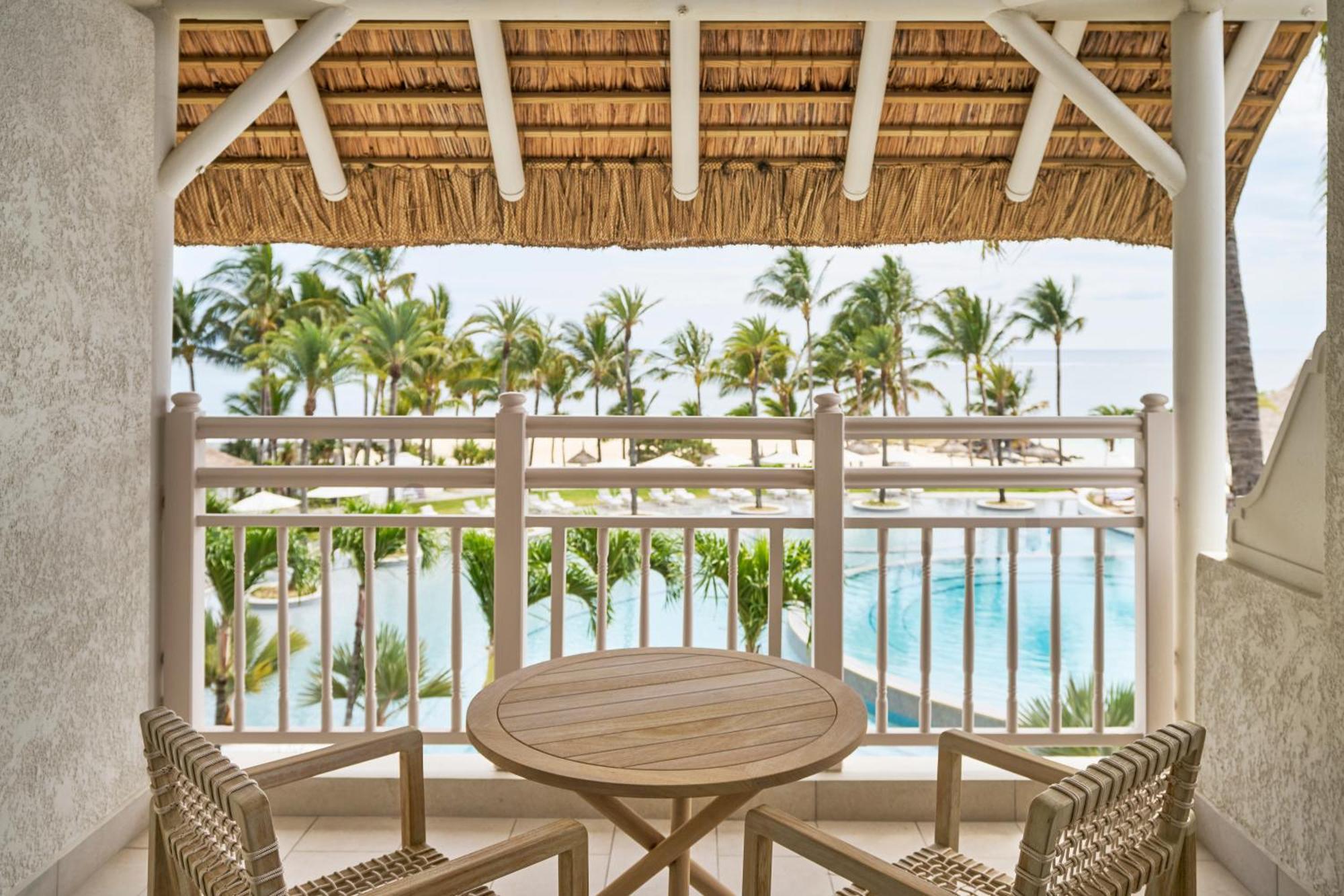 LUX* Belle Mare Resort&Villas Esterno foto Balcony of a guest room