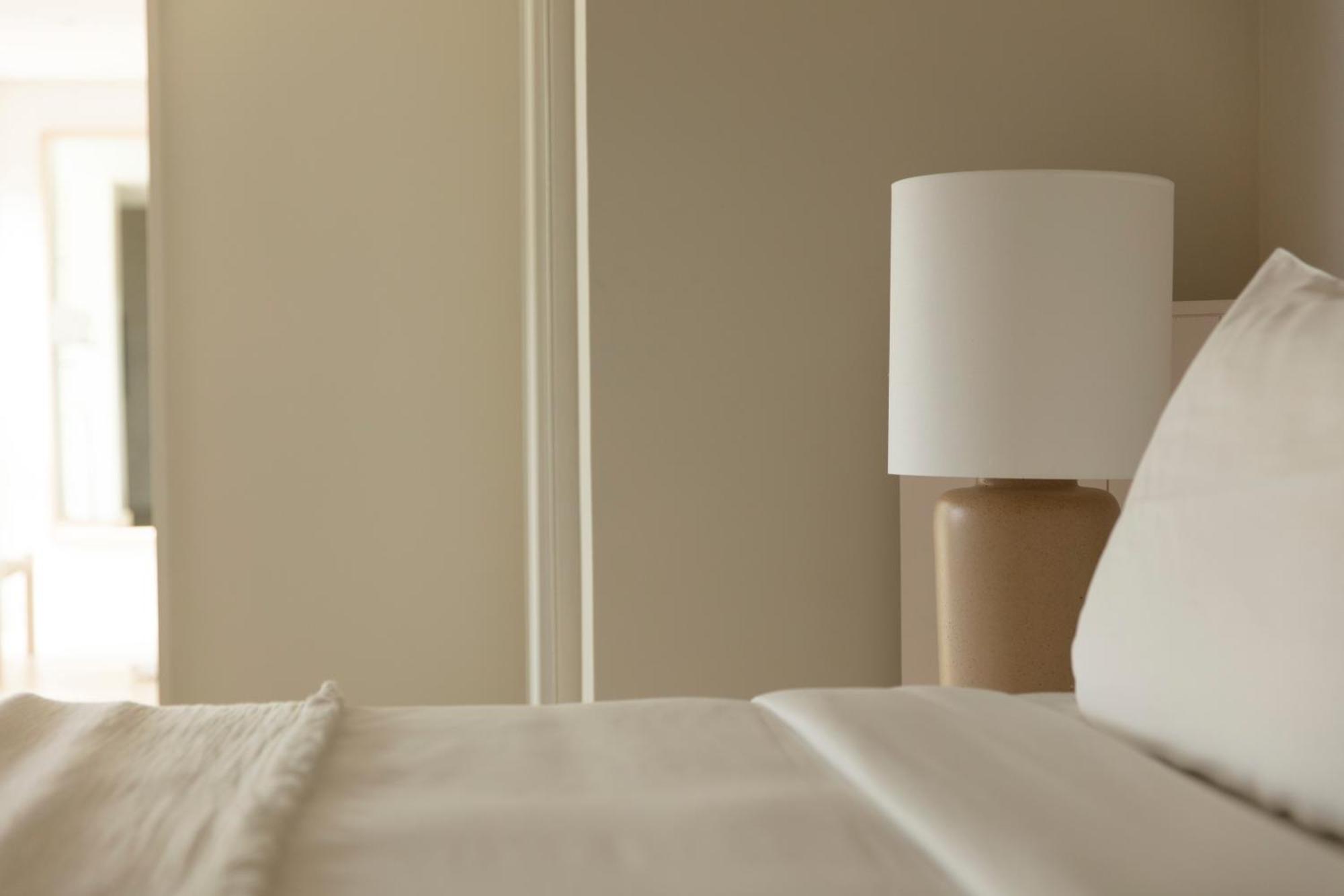 LUX* Belle Mare Resort&Villas Esterno foto A lamp on a bedside table
